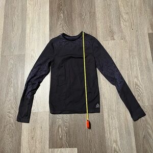 Reebok black and purple midweight running shirt with mesh panel back